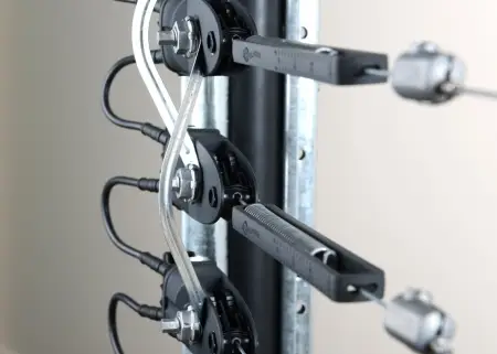 Close-up of the Gallagher Z10 Tension Sensor installed on an electric security fence.